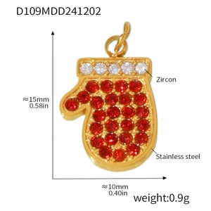 Macro view of Christmas glove pendant with red zircons and stainless steel dimensions