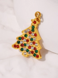 Close-up of Christmas tree pendant with gold finish and colorful inlaid rhinestones