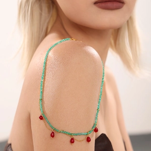 Handmade green bead neck chain with red teardrop stone pendants on gold chains