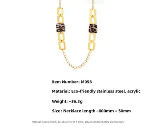 Detailed view of long sweater chain with leopard acrylic square pendants and 18K gold plating