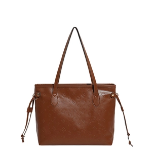 Brown PU leather tote bag with embossed cat girl pattern and dual shoulder straps