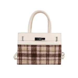 Retro contrastkleur handtas met crème leer, ruitjesstof en zilveren draaisluiting