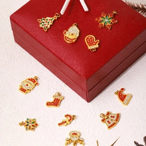 Christmas themed gold-plated titanium pendants with colorful zircons in a festive gift box