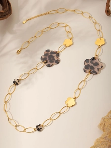 Detail of 18K gold-plated stainless steel chain with leopard print acrylic floral charms
