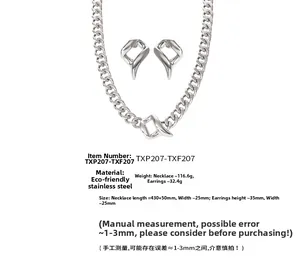 Detailed view of heavy stainless steel jewelry set including chunky necklace and earrings