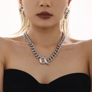 Polished heavy stainless steel chunky chain necklace and matching earrings set on model