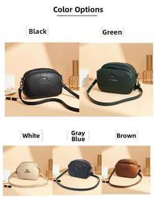 Vue détaillée des cinq couleurs élégantes et du cuir PU texturé du sac à trois fermetures