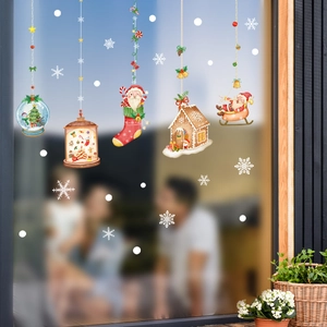 Kerst raamstickers set met Kerstman en sneeuwvlokken op glazen oppervlak gedecoreerd