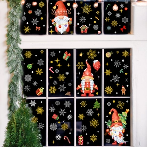 Cozy Christmas gnomes and snowflake window static clings on white pane window frame