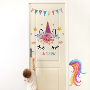 Detailed view of watercolor unicorn door decals with rainbow bunting and golden stars