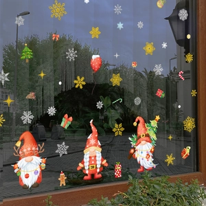Christmas gnome window clings with snowflakes and pine tree decorations for glass surface