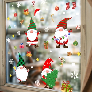 Christmas window decals with gnomes, snowflakes and stars for festive glass decoration