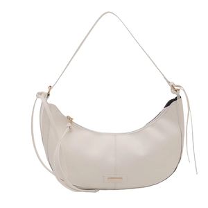 Minimalist cream white crescent shoulder bag with gold metal plate and stylish leather tassels