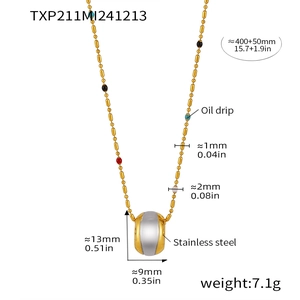 Detail showing dimensions of bi-color stainless steel cylinder pendant on gold bead chain