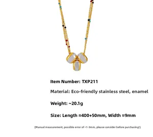 Detail view of colorful bead layered necklace with gold-plated stainless steel pendants