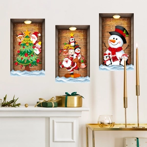 3D Christmas wall stickers set featuring Santa, snowman and reindeer on white wall