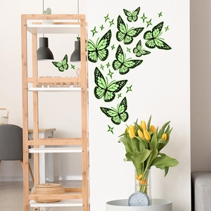Luminous butterfly wall stickers in various sizes with small stars for home room decoration