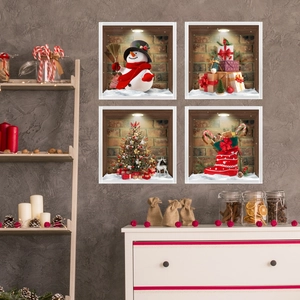 Detail of 3D Christmas wall stickers with snowman, tree and gift box on a grey wall