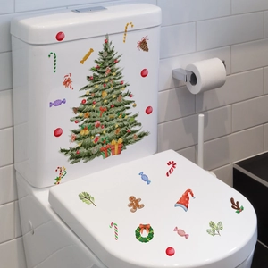 Stickers de sapin de Noël et bonbons pour une décoration festive des toilettes de maison
