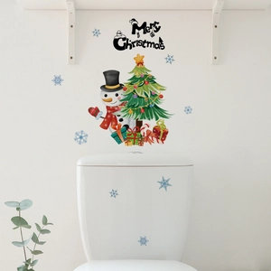 Détail des stickers de Noël Merry Christmas avec bonhomme de neige sur les toilettes