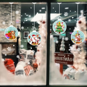 Detail of Santa and reindeer electrostatic window stickers on glass for Christmas decor
