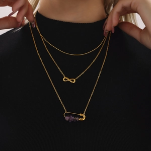 Three-layer gold stainless steel necklace with infinity charm, safety pin and purple stones