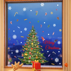 Christmas tree window sticker with snowflakes and gingerbread man for festive decoration