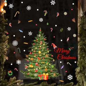Detail of Christmas tree window clings with snowflakes and gingerbread man stickers