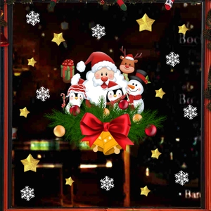 Detail of Christmas static window stickers with Santa, reindeer and golden bells