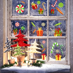 Christmas tree wall stickers with candies and gift boxes on a frosted wooden window