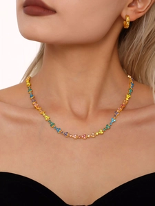 Close-up of luxury 18k gold plated necklace with colorful zircon flower clusters