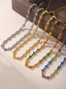 Detail of luxury 18k gold plated stainless steel necklaces with colorful zircon stones