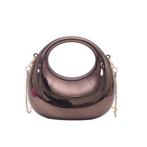 Mini crescent acrylic handbag with bronze metallic finish and gold crossbody chain