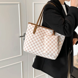 Vintage patterned tote bag and matching clutch set with brown leather handles