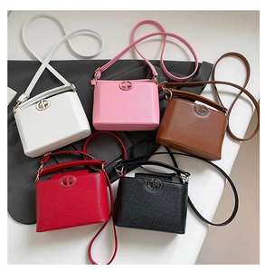 Detailed overhead view of structured cross-grain PU leather bags in five classic colors