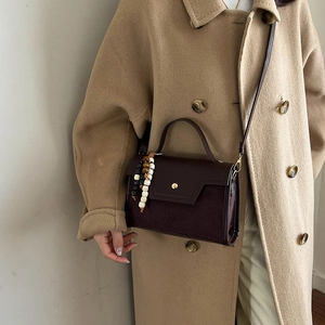 Retro dark brown leather and suede baguette bag with beads and gold magnetic clasp