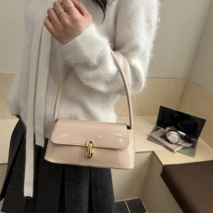 French style beige patent leather baguette bag with gold twist lock for women