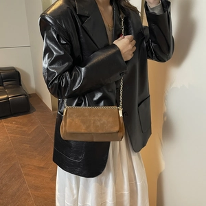 Brown suede crossbody chain bag for women with minimalist retro design and gold hardware