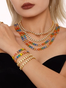 Lustrous 18K gold plated set featuring multi-layered necklaces and bracelets with rainbow zircon