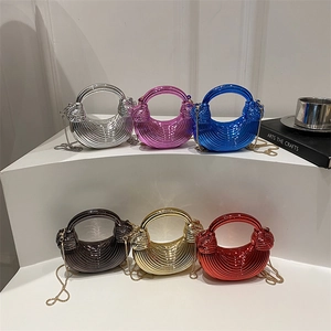 Striped metallic acrylic shell bags in multiple colors with chain shoulder strap