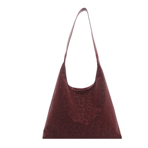 Chic leopard print hobo shoulder bag in deep burgundy with sleek glossy finish