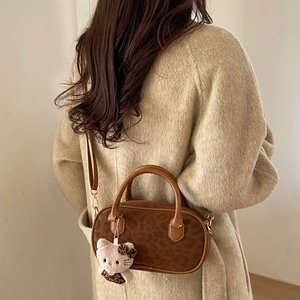Brown leopard print pillow bag with suede texture and cute plush kitten pendant for women