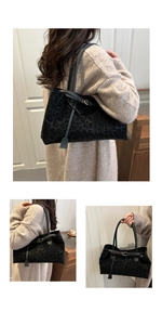 Three-way view of a matte black leopard print tote bag with stylish leather straps