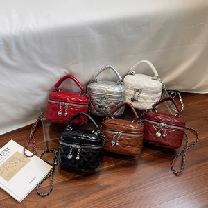 Set of six mini quilted patent leather box bags with chain straps in assorted colors
