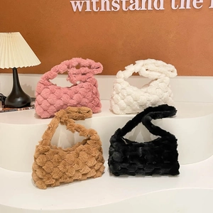 Large capacity plush woven crossbody bags for women in four colors on a tiered display