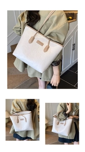 Detail of white tote bag featuring embossed cartoon patterns and FASHION label accent