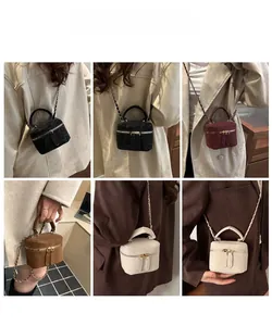 Mini velvet cylinder bags with chain straps in leopard print, red, brown, and beige colors
