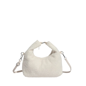 Chic cream lamb wool half-moon handbag with metal rings and adjustable shoulder strap