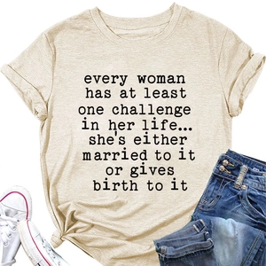 Detail of light beige cotton t-shirt with black text quote on white background