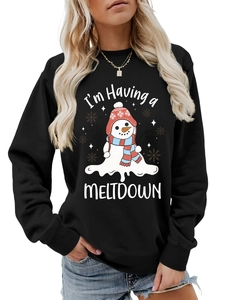 Detail showing Melting Snowman print and 'I'm Having a Meltdown' text on black sweatshirt